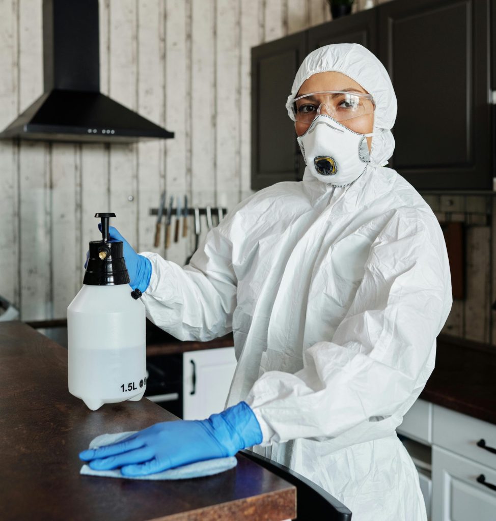 Pest control technician inspecting a home in the UAE